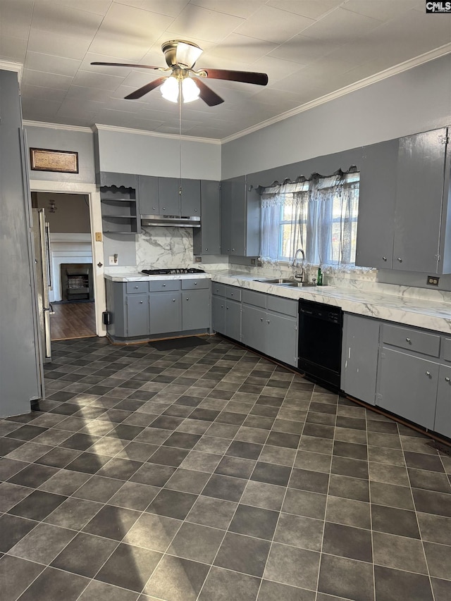 kitchen featuring gray cabinets, tasteful backsplash, sink, stainless steel appliances, and crown molding