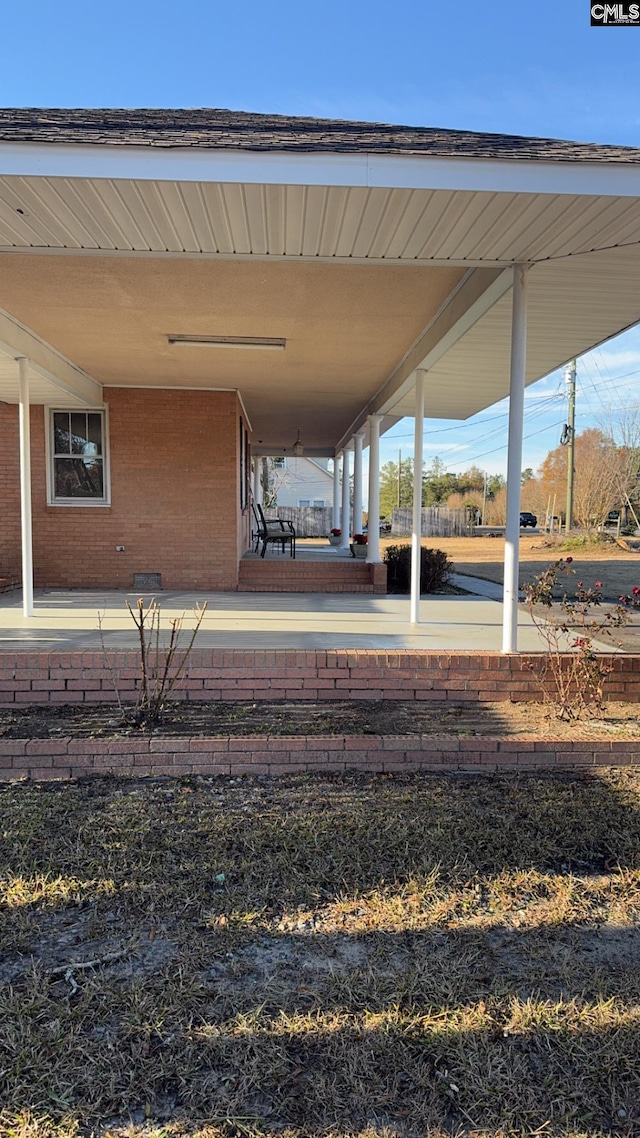 view of yard with covered porch