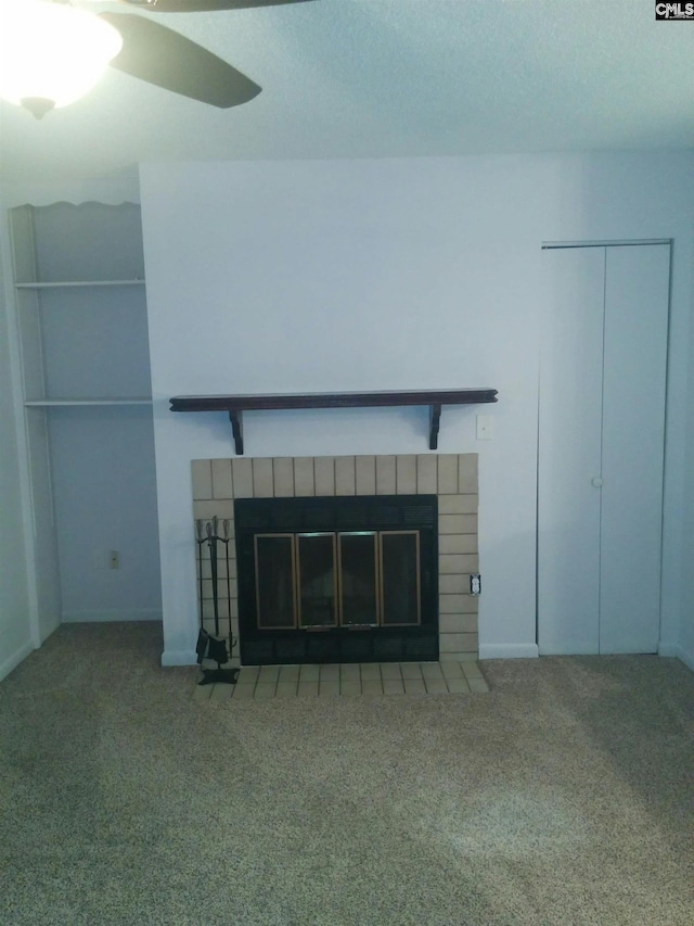 1211 Metze Rd Unit J8, Columbia, SC 29210 - room details with a tile fireplace, a textured ceiling, and carpet flooring