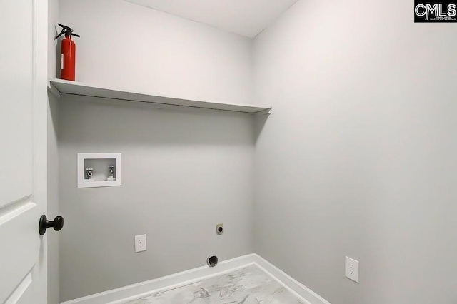 clothes washing area with hookup for an electric dryer and hookup for a washing machine