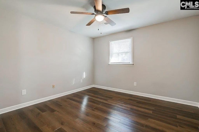 unfurnished room with dark wood-type flooring and ceiling fan