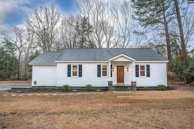 single story home with a front yard