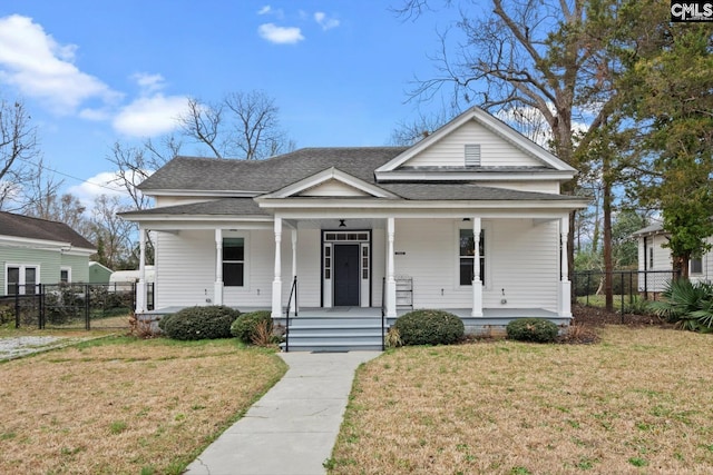 view of front of home featuring a front lawn and covered porch