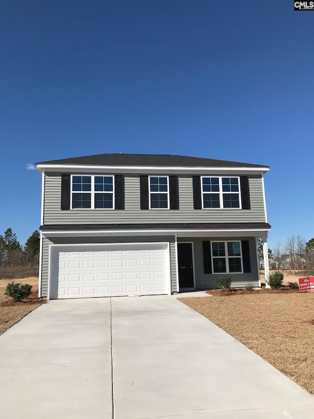 view of property with a garage