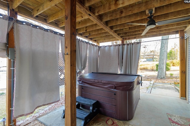 view of patio / terrace with a hot tub