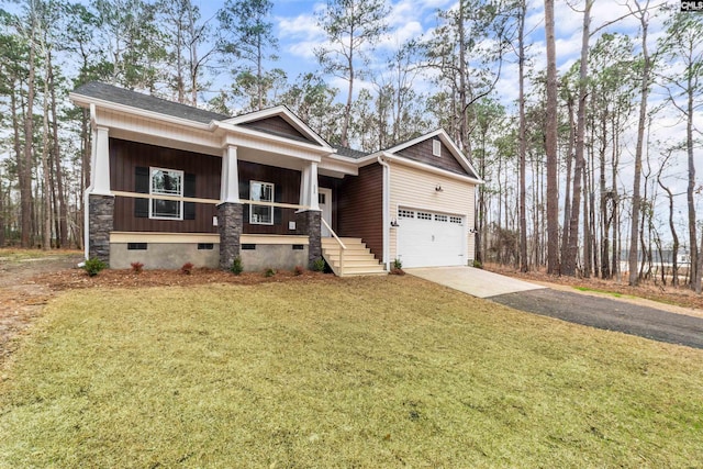 craftsman-style house featuring a garage, a porch, and a front yard