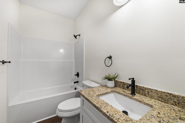 full bathroom featuring vanity, toilet, and tub / shower combination