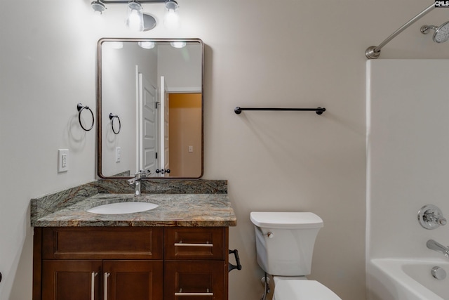 full bathroom featuring vanity, shower / washtub combination, and toilet