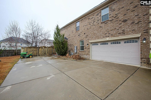 view of side of property featuring a garage