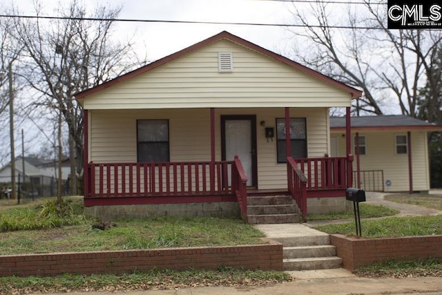 bungalow featuring a porch