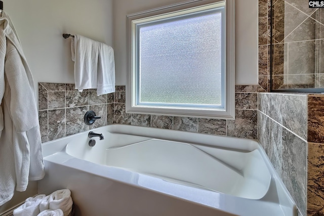 bathroom with a tub