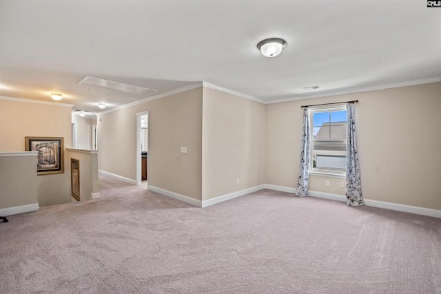 carpeted empty room with crown molding