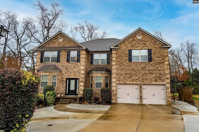 view of front of property featuring a garage