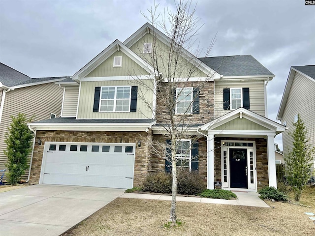 craftsman house with a garage