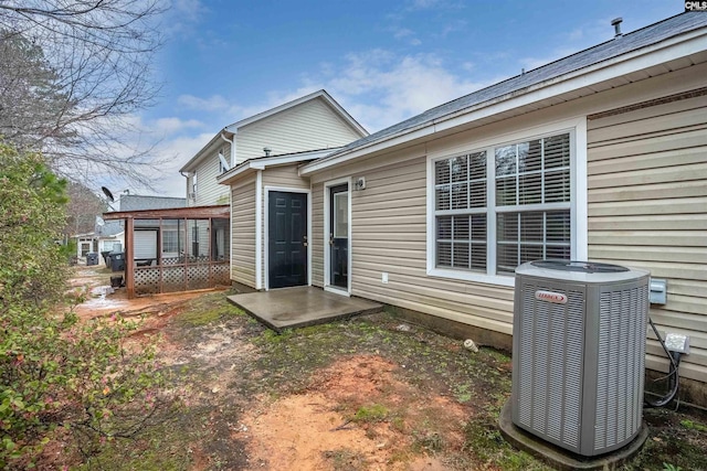 back of property with central AC unit