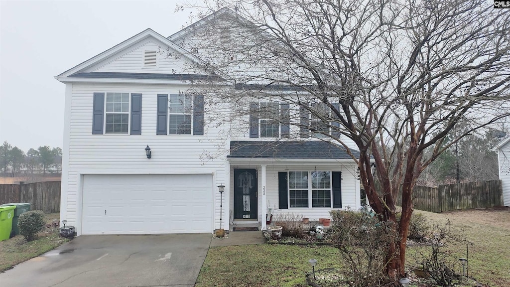 view of front of home with a garage