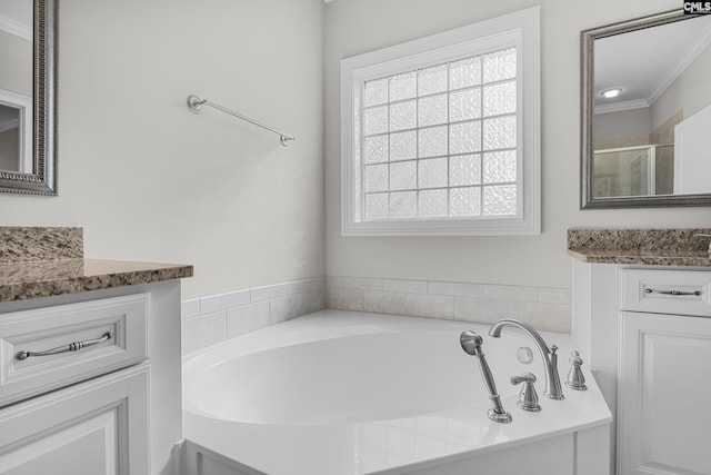 bathroom with crown molding, vanity, and a shower with shower door