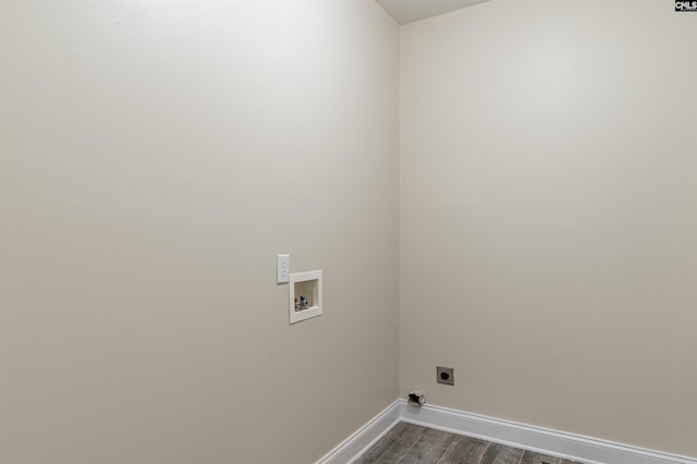 laundry room featuring dark hardwood / wood-style floors, hookup for an electric dryer, and hookup for a washing machine