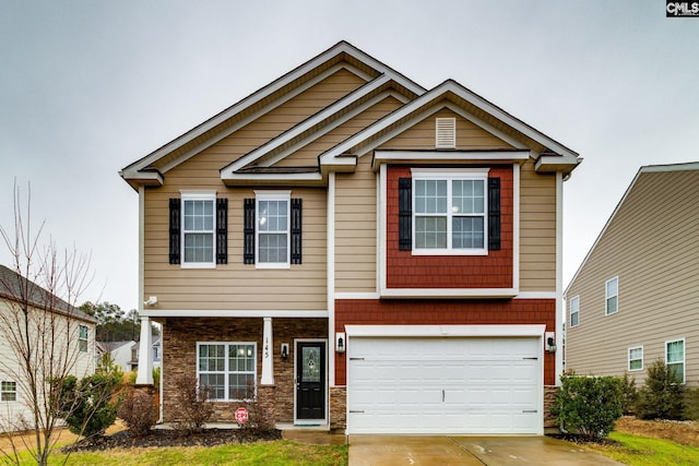 craftsman house featuring a garage