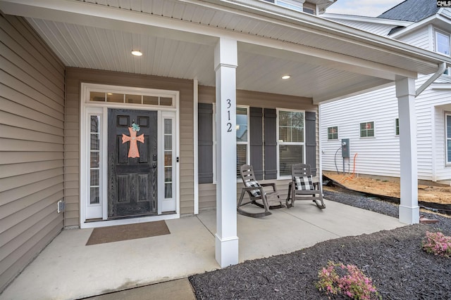 doorway to property with a porch