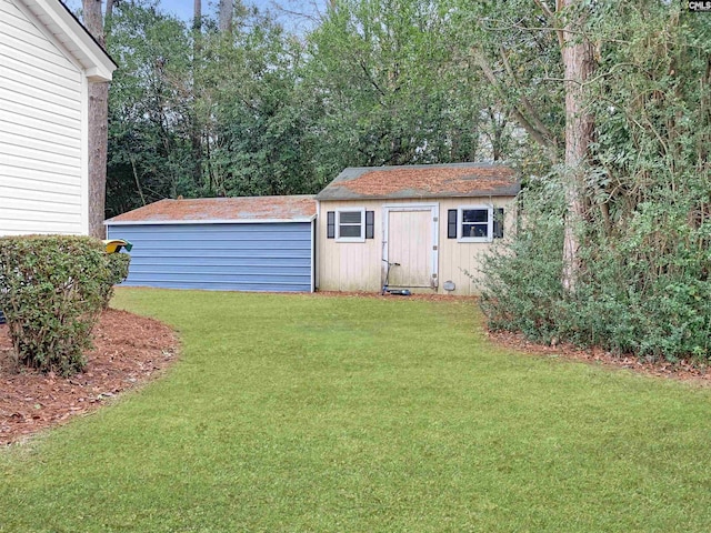 view of outdoor structure featuring a yard