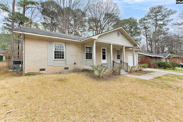 ranch-style house with central AC unit, a front yard, and covered porch