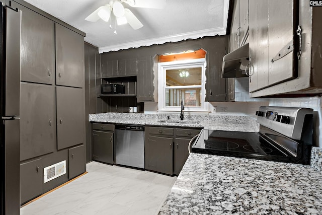 kitchen with sink, ceiling fan, appliances with stainless steel finishes, ventilation hood, and light stone countertops