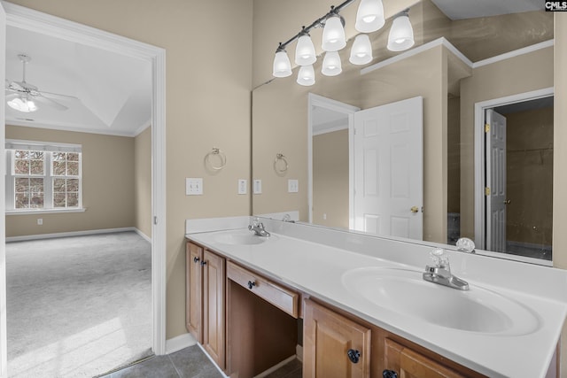 bathroom with vanity, ornamental molding, and ceiling fan