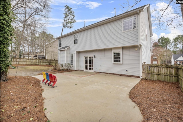 rear view of property with a patio area