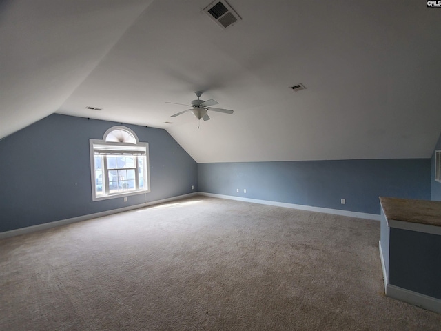 bonus room featuring vaulted ceiling, ceiling fan, and carpet floors