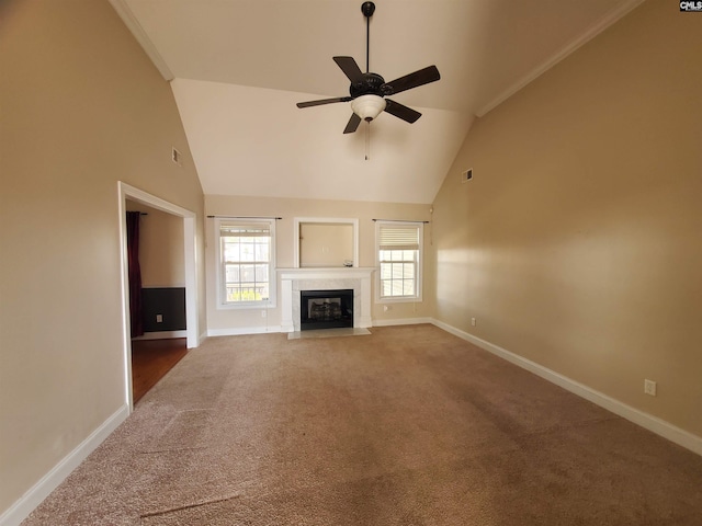 unfurnished living room featuring a fireplace, high vaulted ceiling, ceiling fan, and carpet flooring