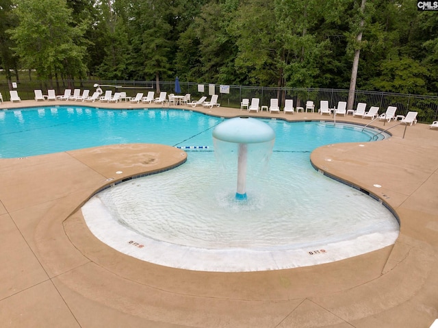 view of swimming pool featuring a patio