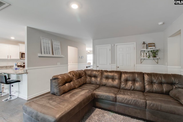 living room with wood-type flooring