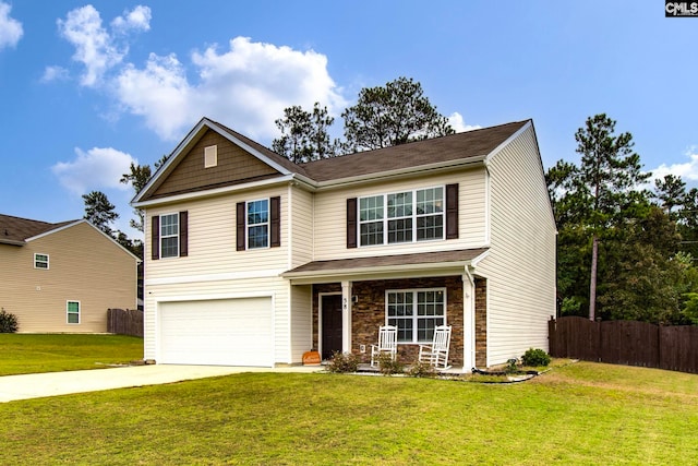 view of front facade with a garage and a front yard