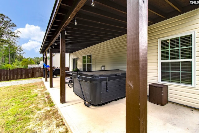 view of patio / terrace featuring a hot tub