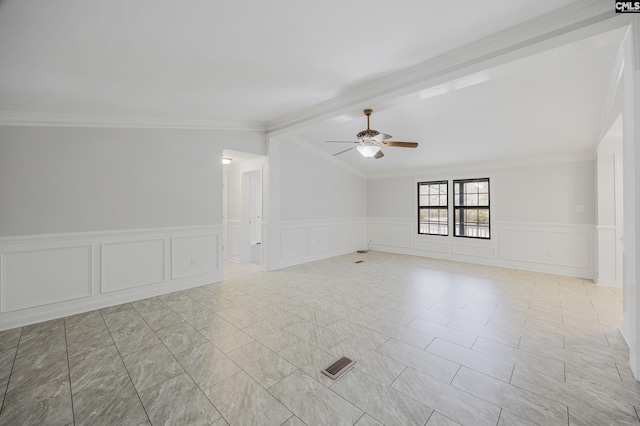 spare room with lofted ceiling with beams, crown molding, and ceiling fan