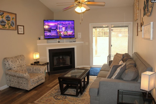 living room with ceiling fan and wood-type flooring