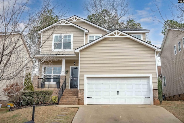 craftsman house with a garage