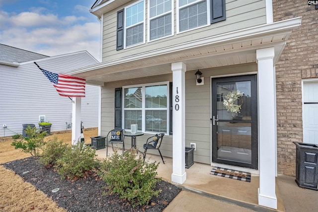 entrance to property with covered porch