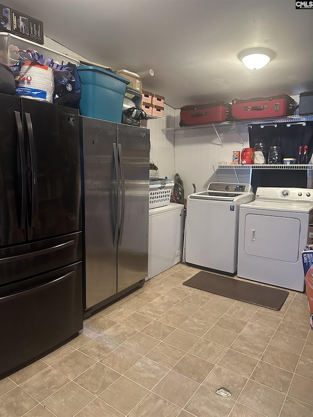 laundry room featuring washer and clothes dryer