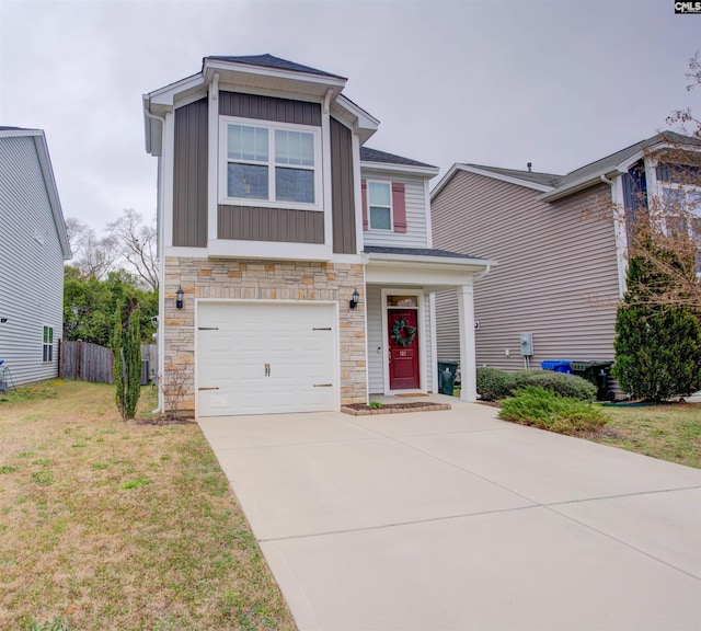 view of front of home featuring a garage and a front lawn