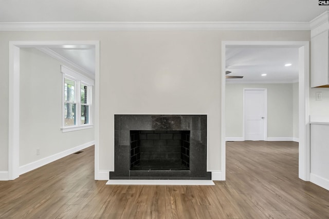 details featuring crown molding and hardwood / wood-style floors