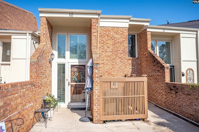 property entrance with a patio