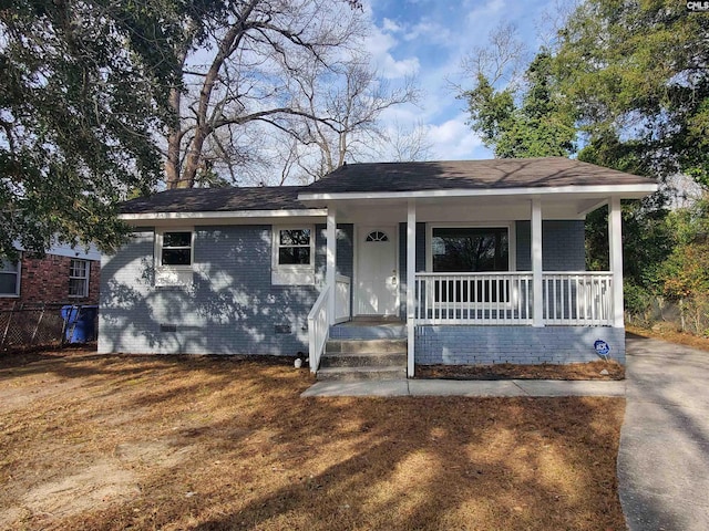 bungalow-style home featuring a porch