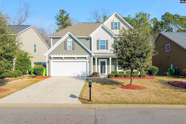 view of front facade with a garage and a front lawn