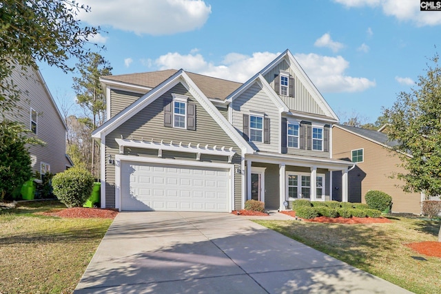 576 Flat Creek Dr, Blythewood, SC 29016 - view of front facade with a front yard, board and batten siding, and driveway