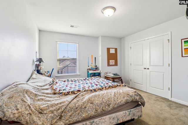 576 Flat Creek Dr, Blythewood, SC 29016 - bedroom featuring light carpet, baseboards, and a closet