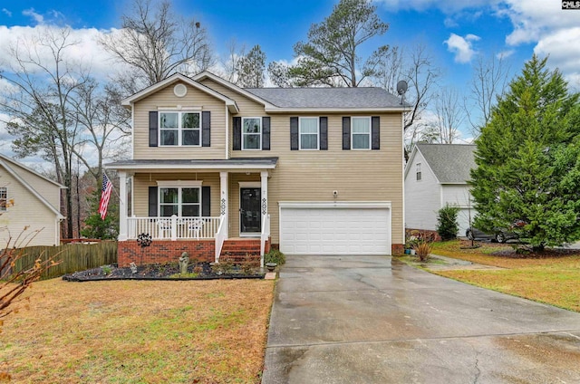 view of front facade with a garage, covered porch, and a front lawn