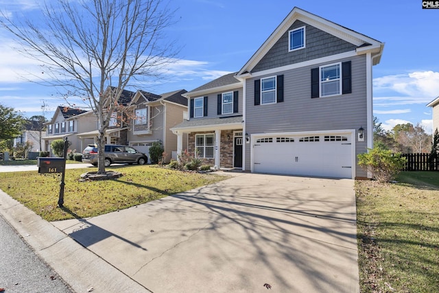 view of front facade featuring a garage and a front yard