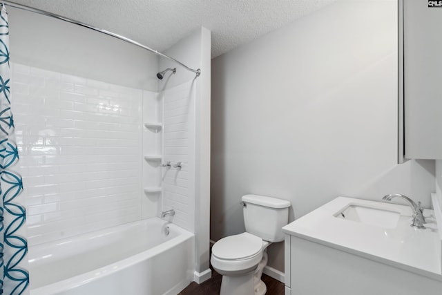 full bathroom with hardwood / wood-style floors, vanity, toilet, shower / bathtub combination with curtain, and a textured ceiling